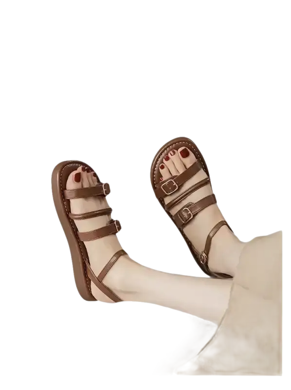 Brown leather buckled sandals.