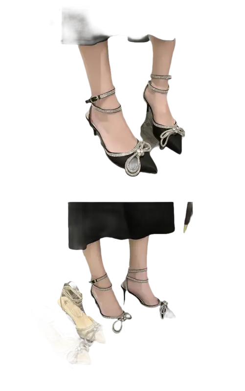 Elegant high-heeled shoes with rhinestone bows.