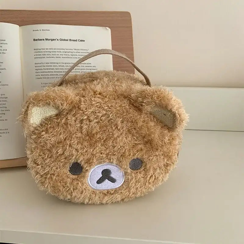 Fuzzy brown bear purse.