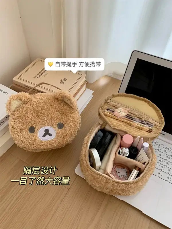 Fuzzy bear-themed makeup bag.