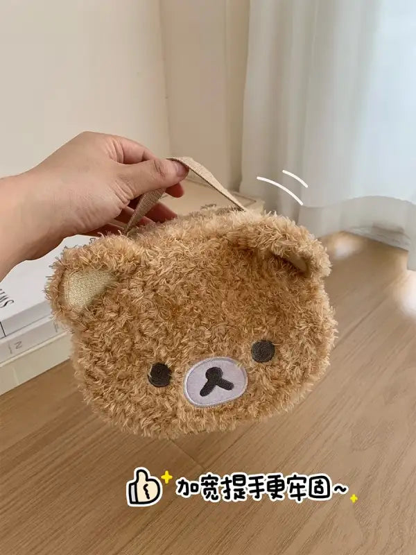 Fuzzy brown bear purse.