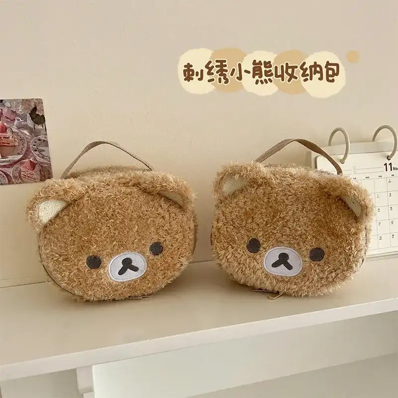 Two fuzzy bear-shaped bags.