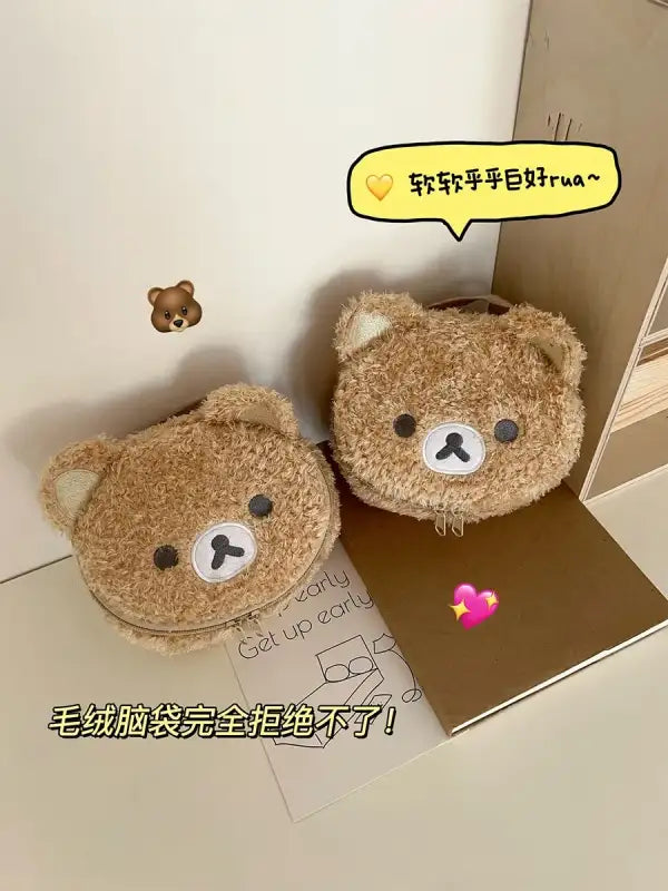 Two fuzzy bear-shaped purses.