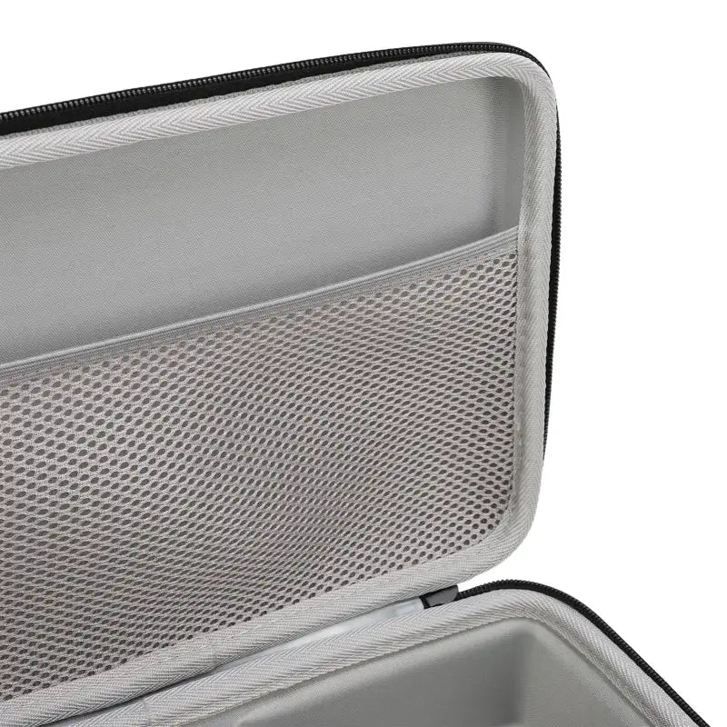Open gray zippered case.