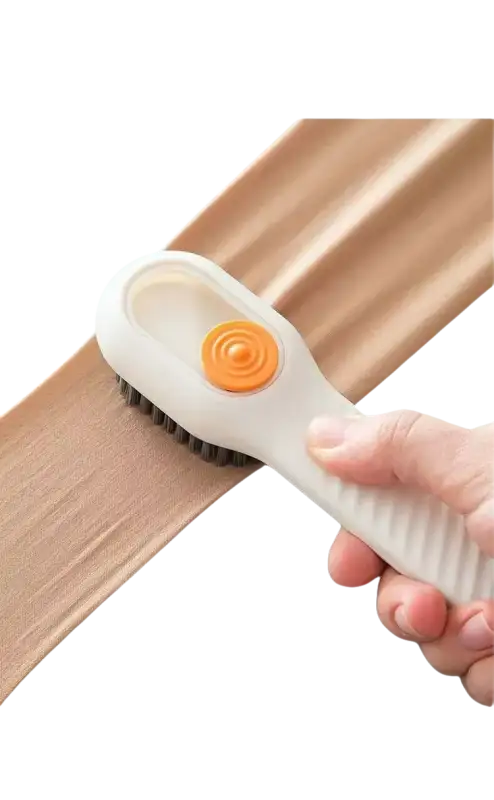 Soft bristle cleaning brush.