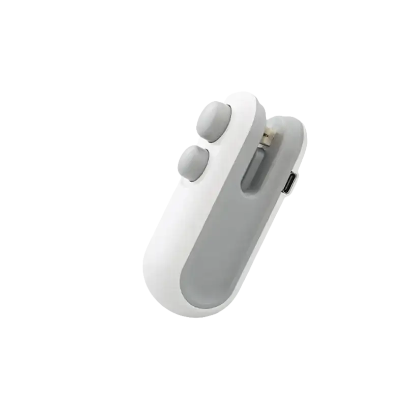 White and gray handheld bag sealer.