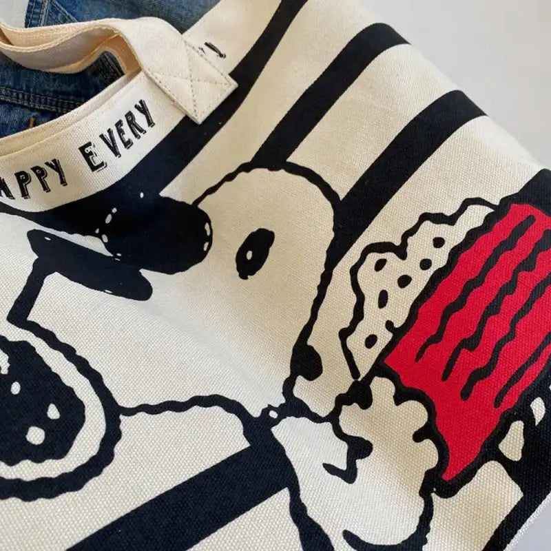 Canvas tote bag with cartoon design.