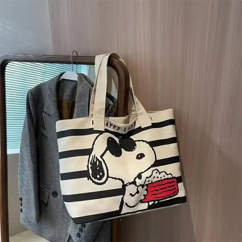 Snoopy-themed striped tote bag.
