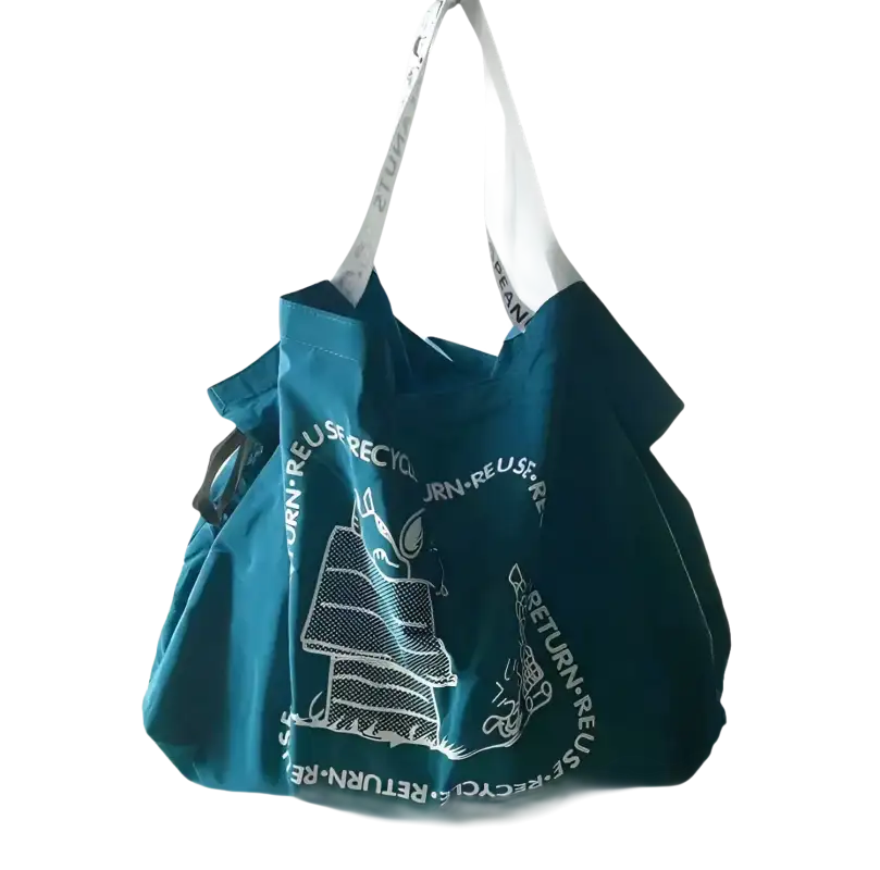 Teal tote bag with white straps.