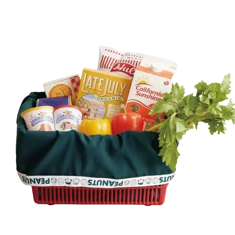 Groceries in a red basket.