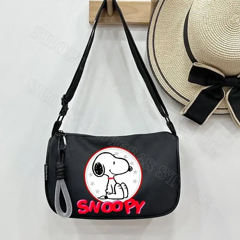 Black Snoopy shoulder bag.