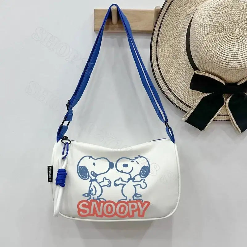 White Snoopy shoulder bag.