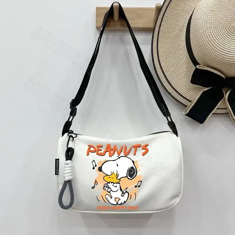 White Snoopy shoulder bag.