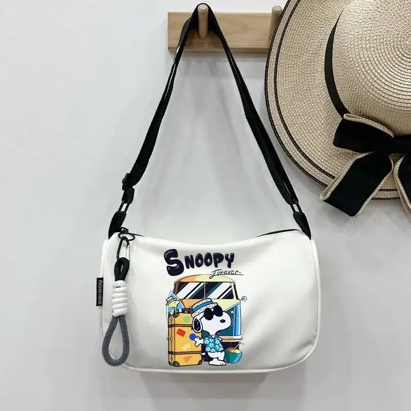 White Snoopy shoulder bag.