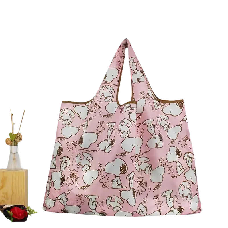 Pink Snoopy-patterned reusable shopping bag.