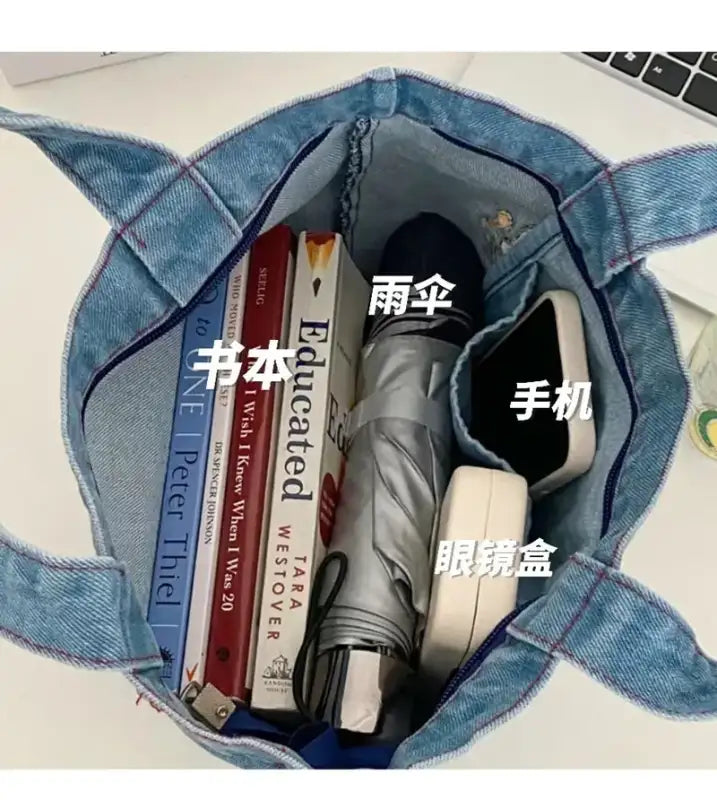 Denim tote bag with contents.