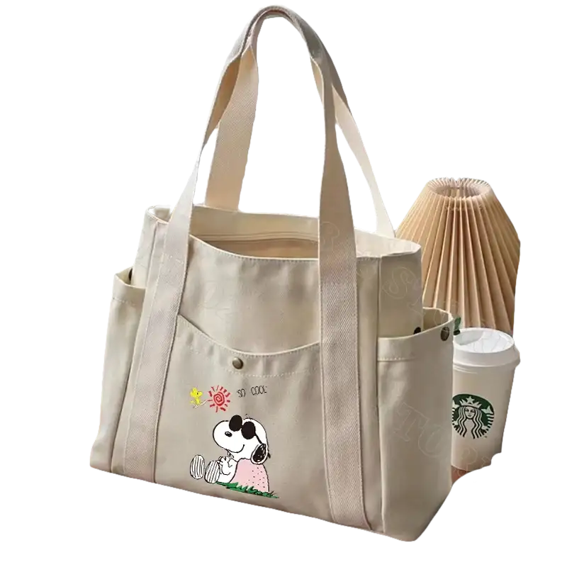 Canvas tote bag with Snoopy design.