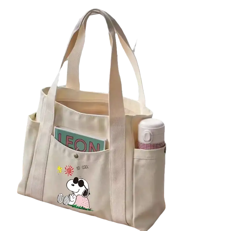 Canvas tote bag with Snoopy design.