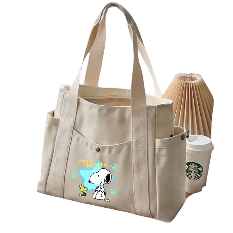 Canvas tote bag with Snoopy design.