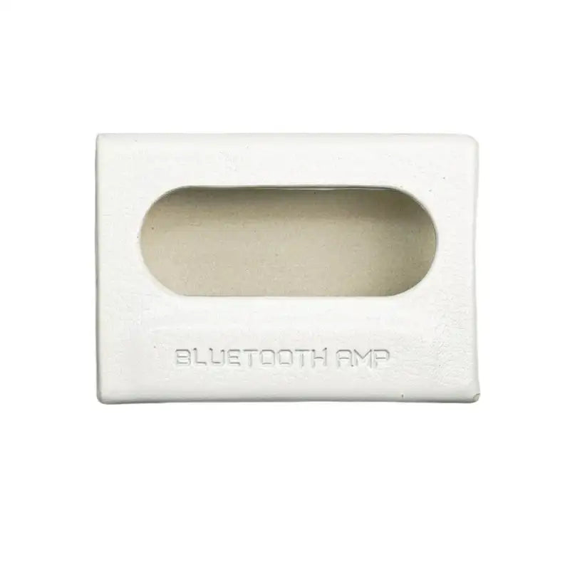 White rectangular Bluetooth amplifier case.