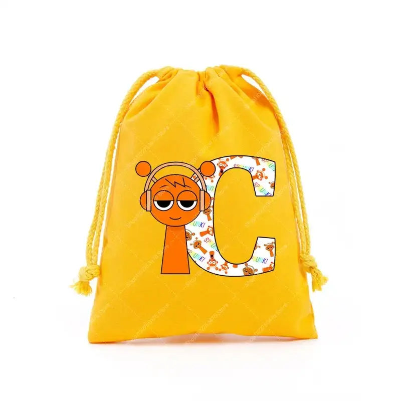 Yellow drawstring bag with cartoon character and letter C.