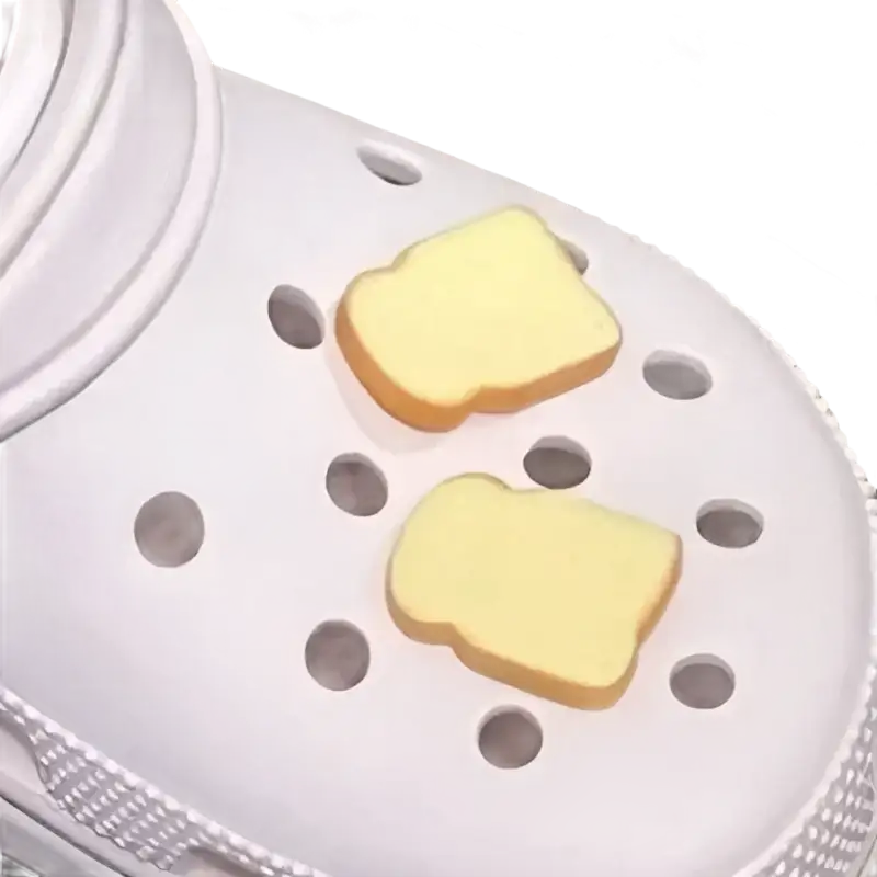 White Croc with bread charms.