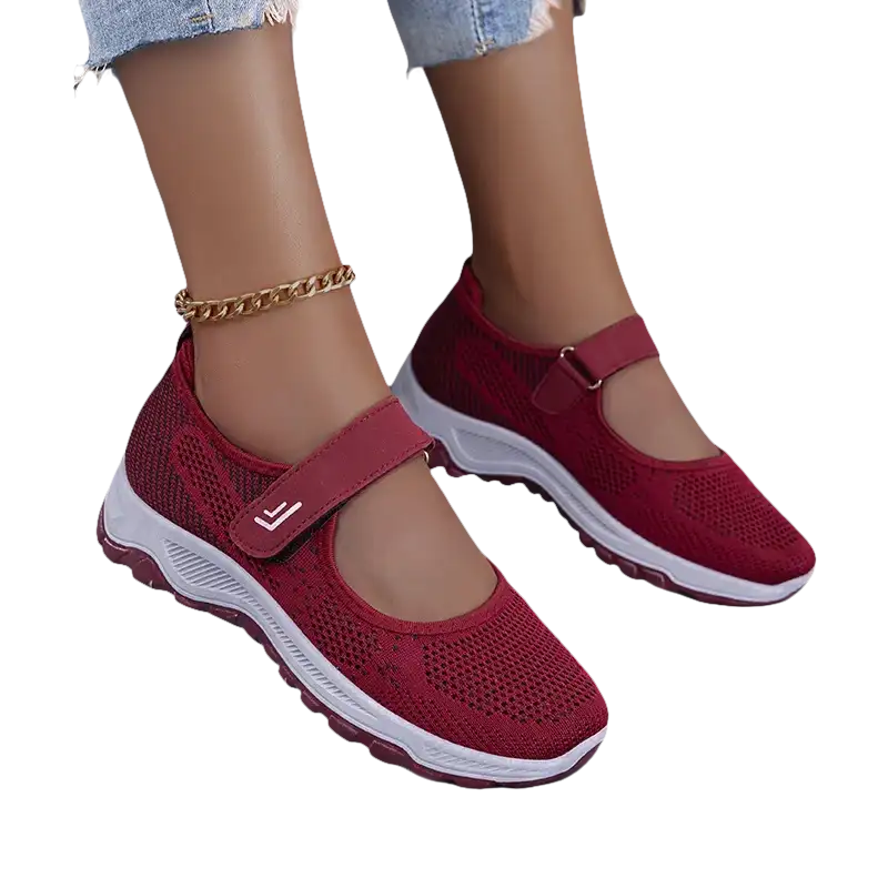 Burgundy Mary Jane sneakers.