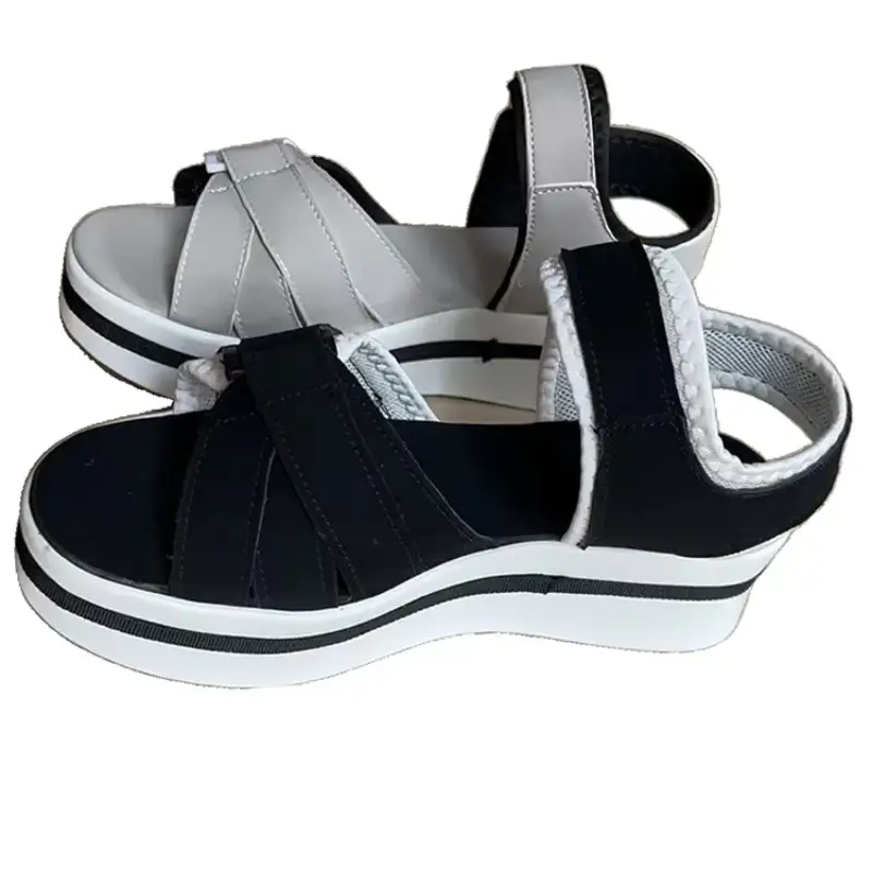 Black and gray platform sandals.