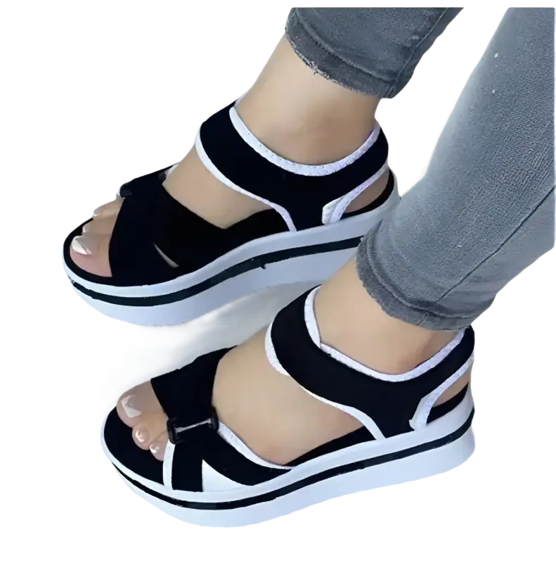Black and white platform sandals.