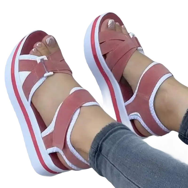 Platform sandals with pink straps.