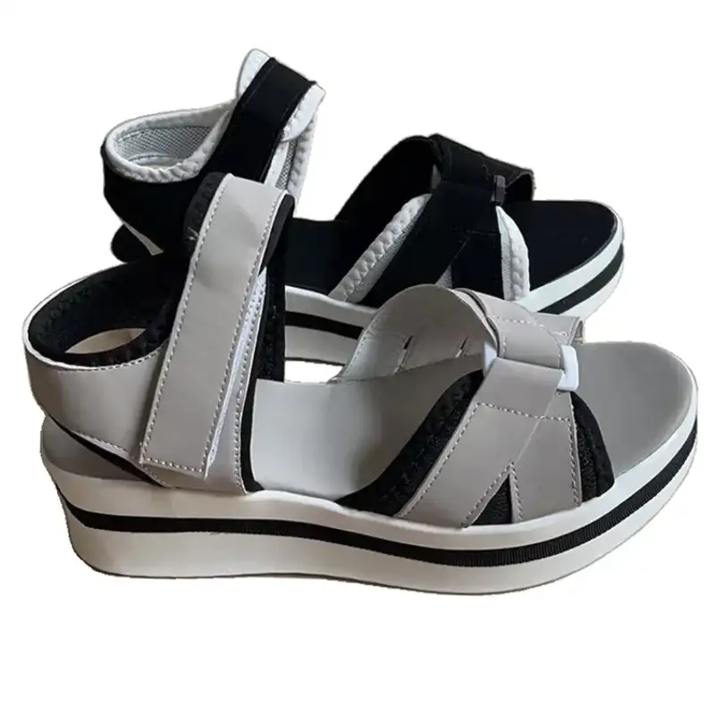 Platform sandals with adjustable straps.