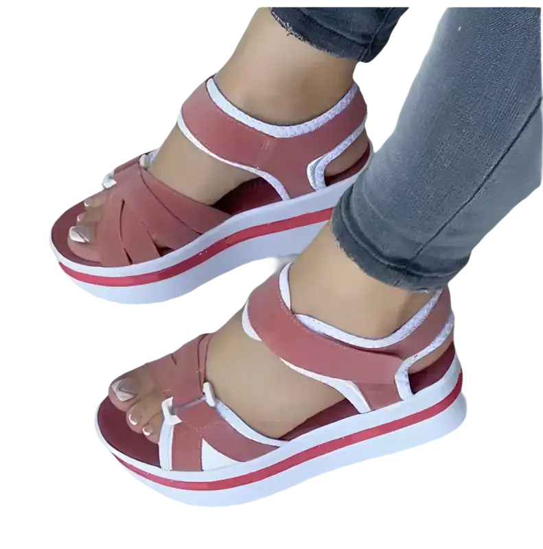 Platform sandals with pink straps.