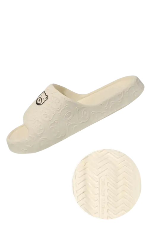 Beige anti-slip textured slipper.