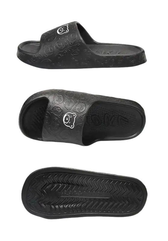 Black cartoon-patterned slide sandal.
