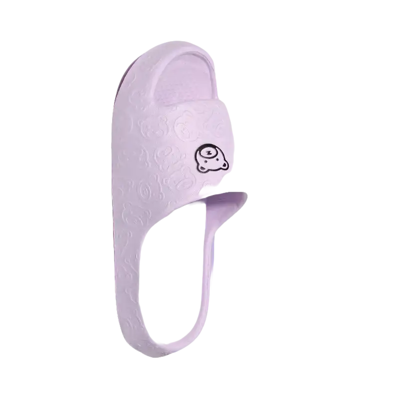 Lavender slipper with cartoon face.