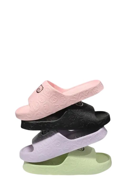 Stacked pastel-colored home sandals.