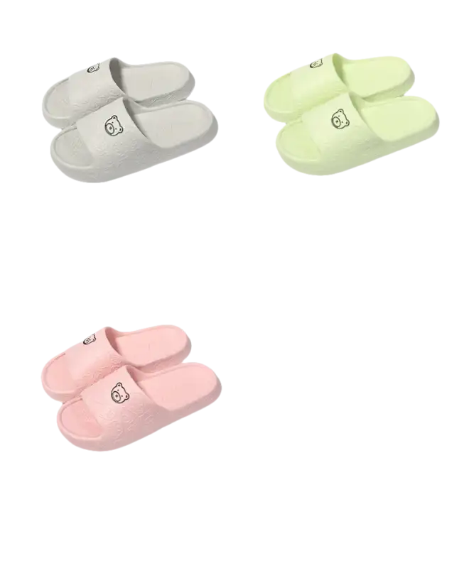 Three pairs of cartoon-emblazoned, pastel-colored slides.