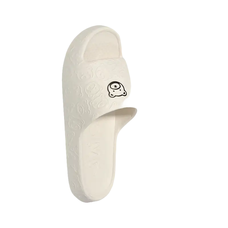 Cream-colored cartoon slippers.