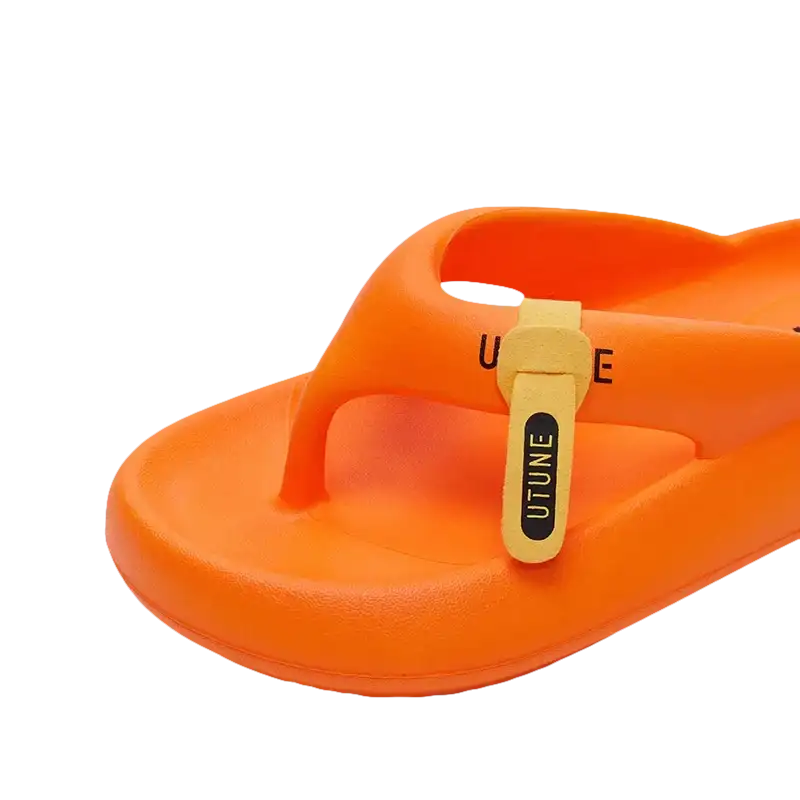 Orange flip-flop with a label.