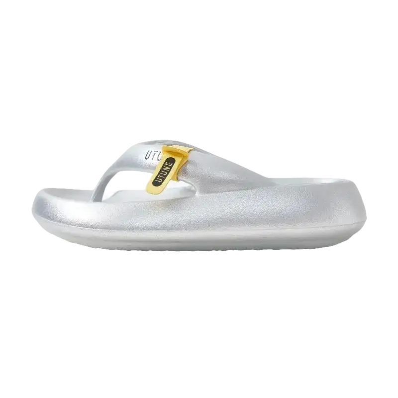 Silver flip-flop sandal with yellow accent.