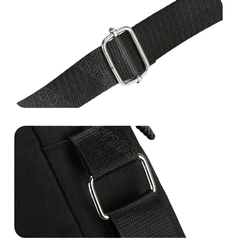 Black bag strap with metal hardware.