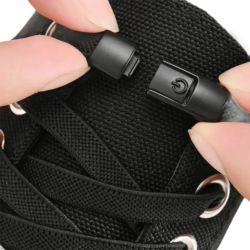 Black magnetic shoelace clasp.