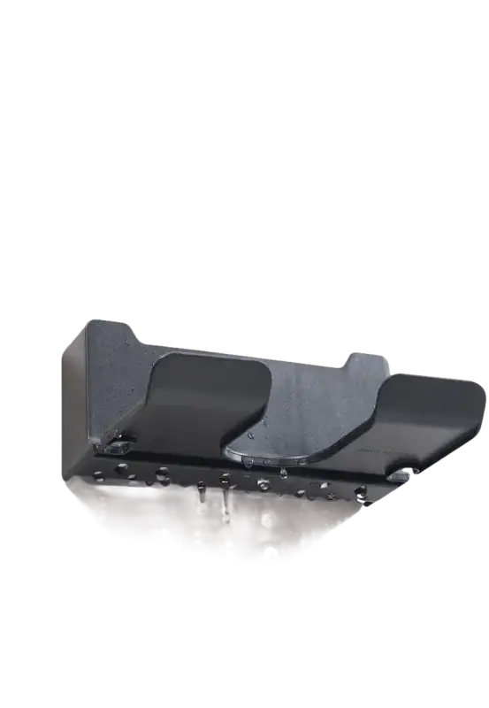 Gray hair dryer shelf with drain holes.