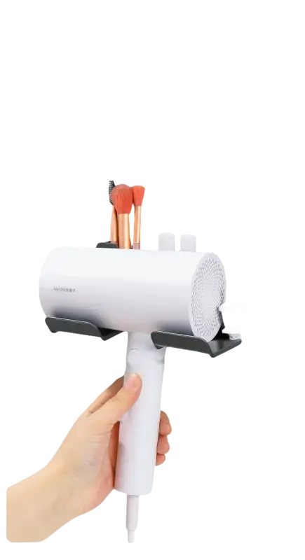 Wall-mounted hair dryer holder.