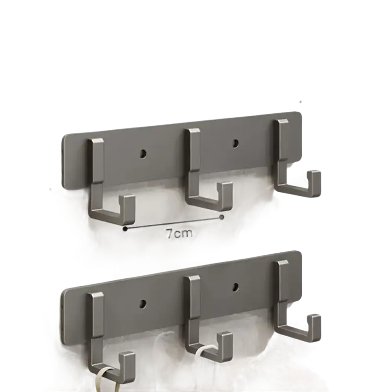 Silver-colored, three-hook wall rack.