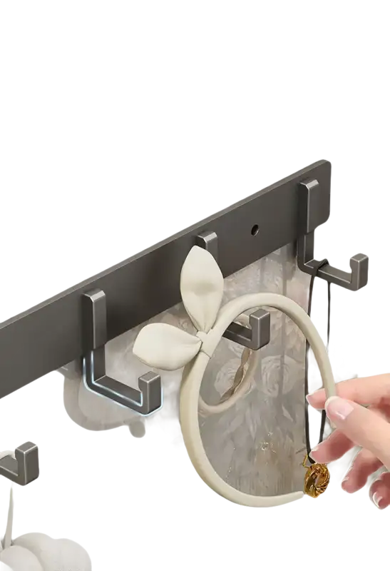 Wall-mounted metal hook rack.