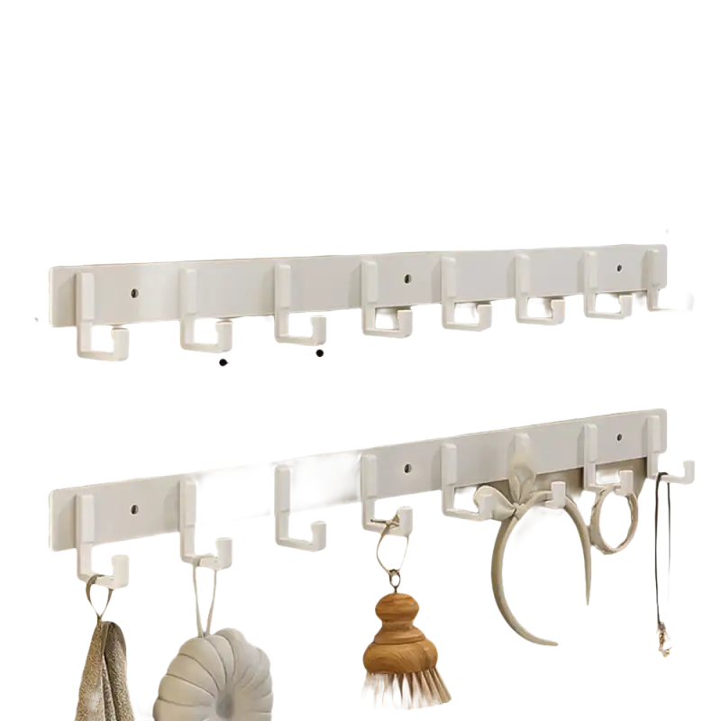 White wall-mounted coat rack with eight hooks.