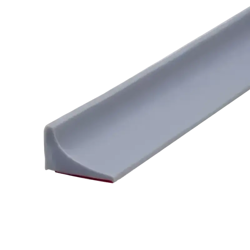 Gray, flexible, adhesive-backed shower threshold.