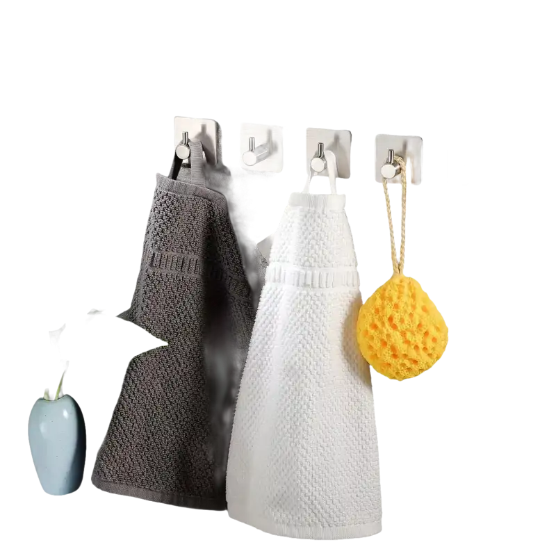 Bathroom towels and sponge on hooks.