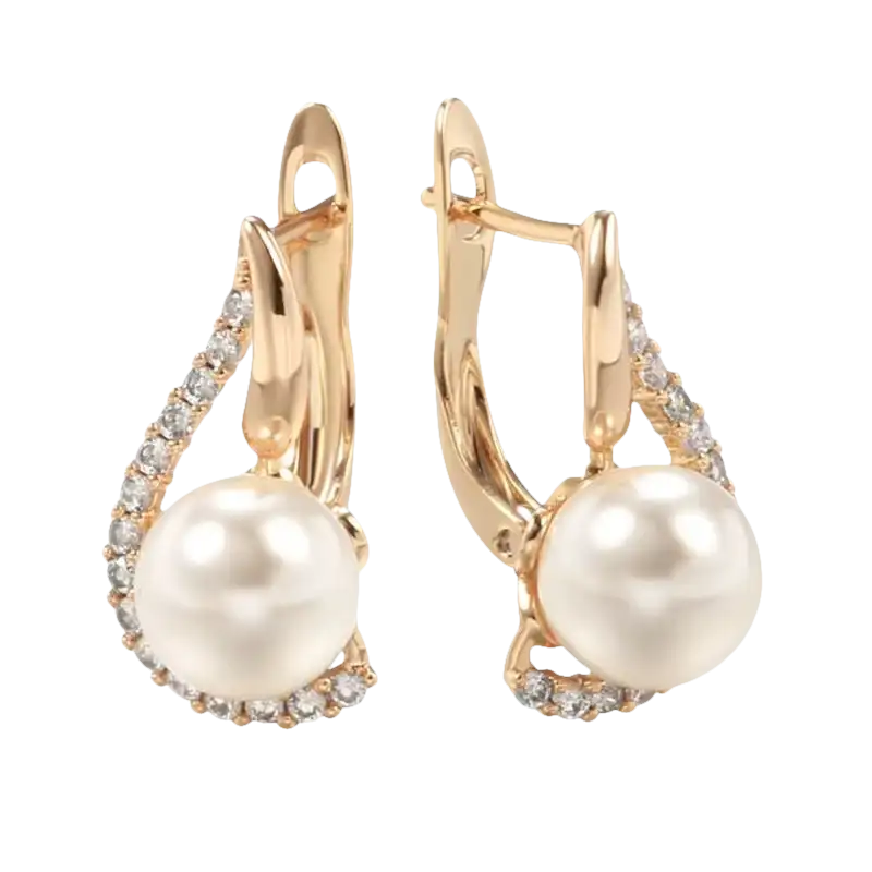 Gold-tone pearl drop earrings.